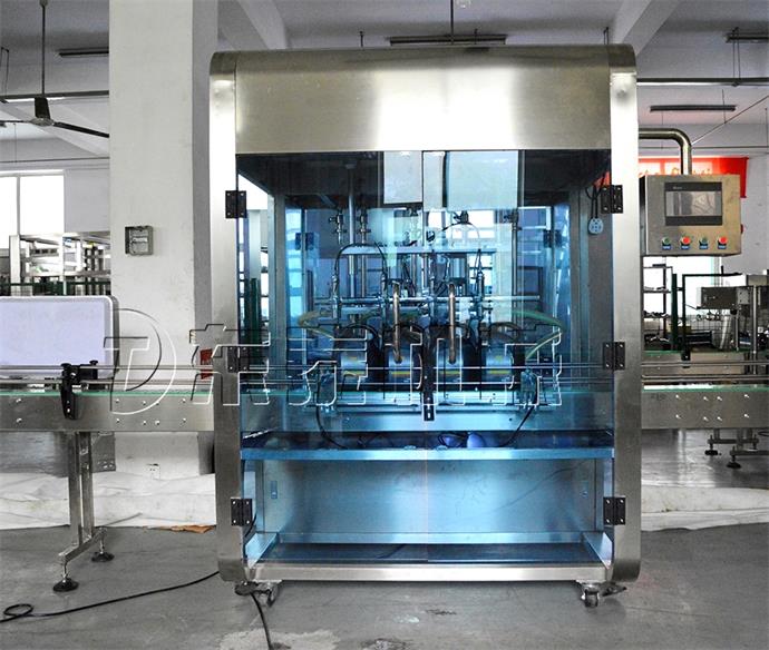 全自動(dòng)油類(lèi)灌裝機(jī).jpg 全自動(dòng)油類(lèi)灌裝機(jī).jpg